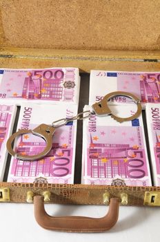 One Suitcase Full of Pink 500 Euros Banknotes and Handcuffs