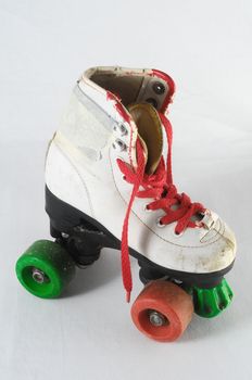 Used Vintage Consumed Roller Skate on a White Background