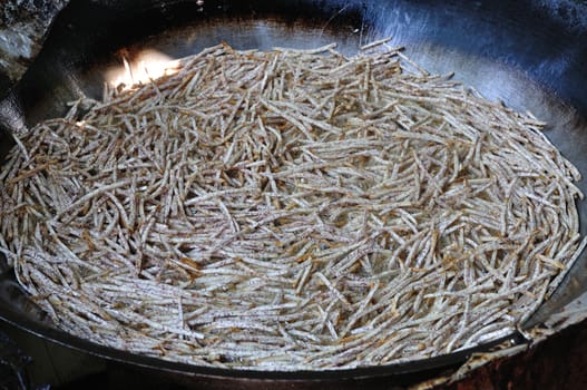 Thai traditional dessert, sliced taro frying in the Pan