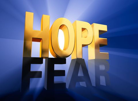 Viewed at a dramatic angle, a shiny, gold "HOPE" stands atop a dark gray "FEAR" on a deep blue background brilliantly back lit with light rays shining through.