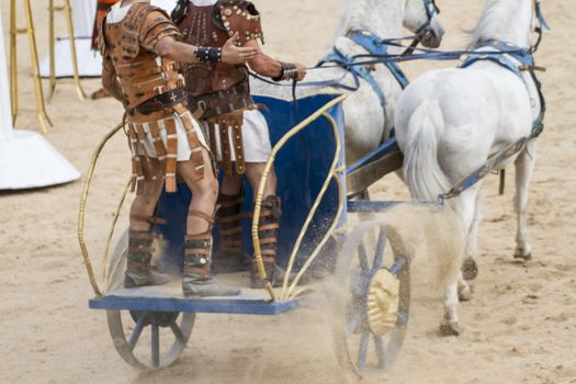 Warriors, Roman chariot in a fight of gladiators, bloody circus