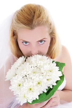 High view of sensual bride holding bouquet isolated on white