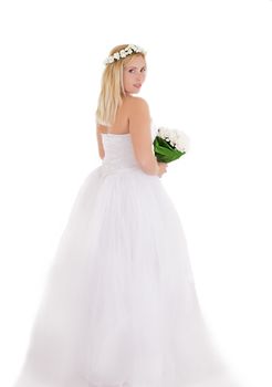 Sensual blonde bride in wreath and bouquet standing backwards isolated on white