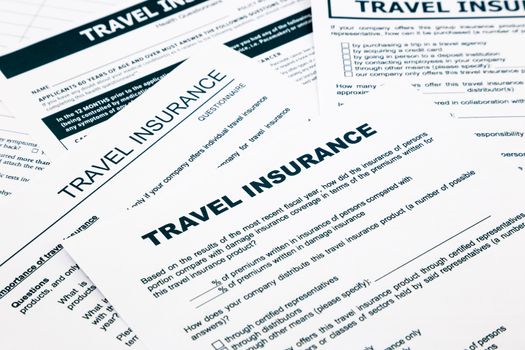 travel insurance form, paperwork and questionnaire for insurance concepts