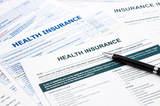 health insurance form, paperwork and questionnaire for insurance concepts