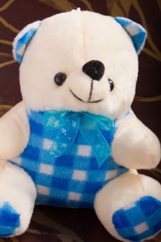 cream blue teddy bear toy