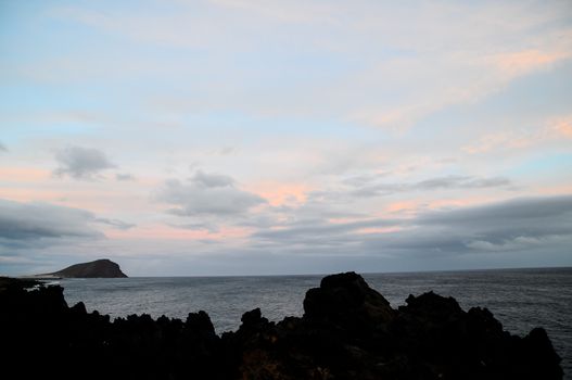 Cloudscape, Colored Clouds at Sunset near the Ocean