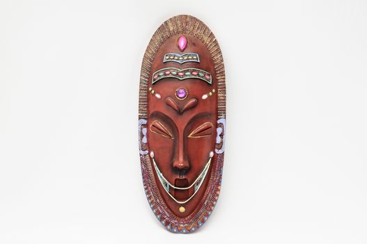 Wooden African Mask on a White Background