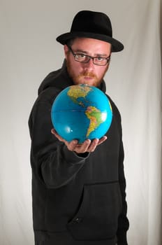 Black Dressed Young Man Holding a Globe Earth