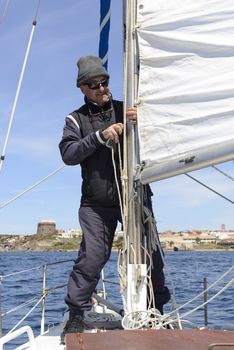 Rigging on Sailboat of the old sailor, who haul down the sail.