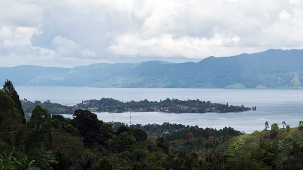 View from Samosir Island to Tuktuk Peninsula. Lake Toba, North Sumatra, Indonesia.