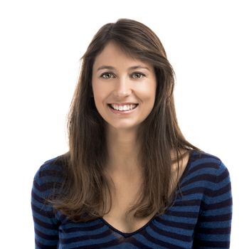 Beautiful and happy woman smiling over a white background