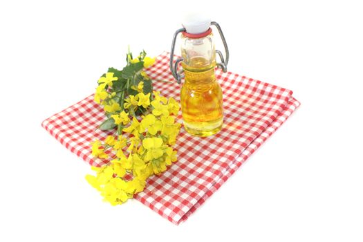 fresh yellow Rapeseed oil on a light background