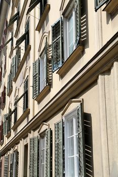 Old windows with shutters in Graz, Austria, Europe.