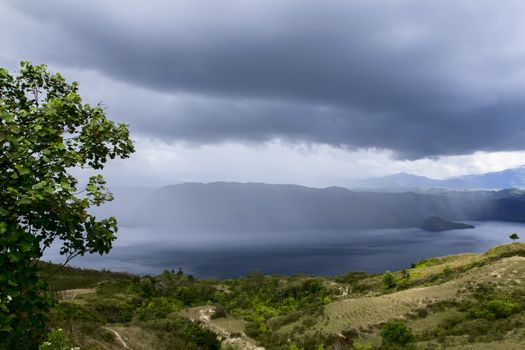 Rainfall. Lake Toba View. Island on North Sumatra, Indonesia.