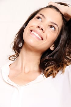 Portrait of a beautiful, laughing, hispanic Woman.