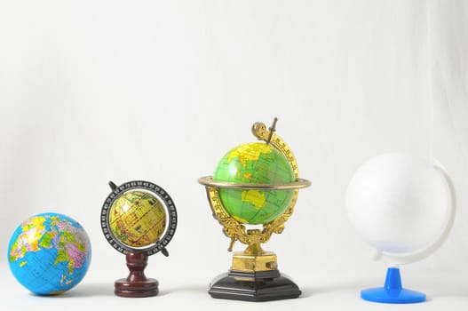 Many Globes Planet Earth on a White Background