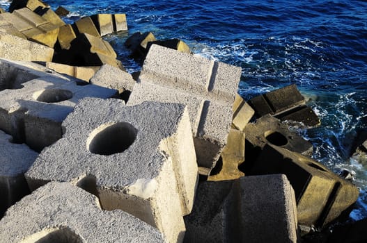 Cubes of Cement Breakwater Protecting Coastline in the Port