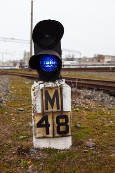Semaphore shows blue signal on the railway.