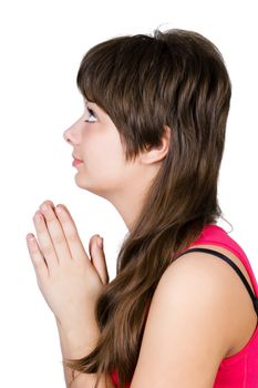 young beautiful girl praying. isolated on white background