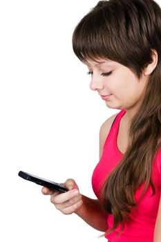 young beautiful girl writes sms. isolated on white background