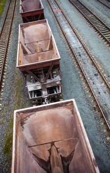 Empty freight wagons passing by. Photographed from above