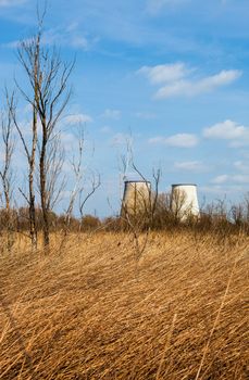 Two cooling towers of the cogeneration plant near Kyiv, Ukraine. Industrial landscape.