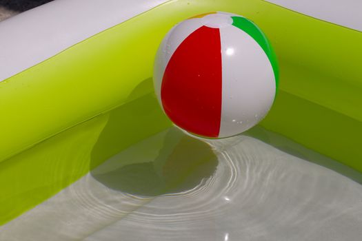 Rubber ball in a swimming pool