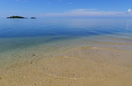 Sandy beach and clear water at Vanua Levu island, Fiji, South Pacific