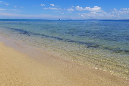 Sandy beach and clear water at Vanua Levu island, Fiji, South Pacific