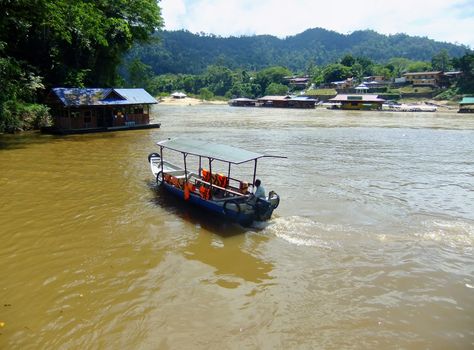 Tourist boat on Tembeling river, Taman Negara National Park, Malaysia