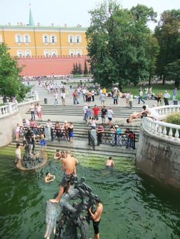 People swimming in a fountain, Alexander Gardens, Moscow, Russia