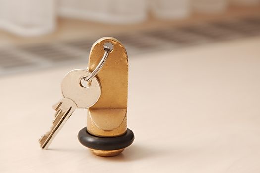 Hotel room key on a table