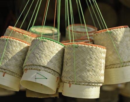 The thai handmade container of cooked glutinous/sticky rice made from bamboo.It use in most northeast of Thailand.