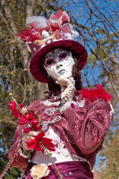 Pink and white person at the 2014 venetian carnival of Annecy, France