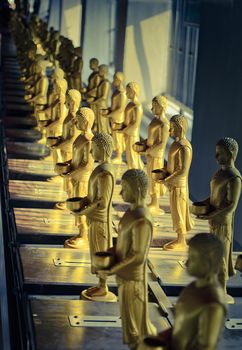 Many little standing buddha image for buddhist's donation in temple.Wat Phra Mahathat Woramahawihan, Nakhon Si Thammarat, Thailand.

http://whc.unesco.org/en/tentativelists/5752/