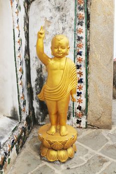 Baby buddha statue at Wat Arun Wararam in bangkok at thailand.