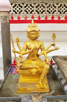 Beautiful golden Brahma statue, Wat Arun Wararam in Thailand. 