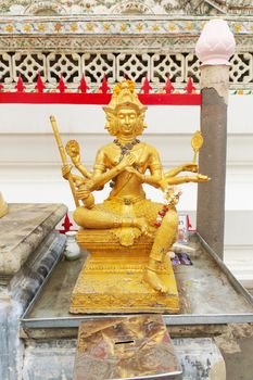 Beautiful golden Brahma statue, Wat Arun Wararam in Thailand. 
