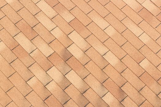 Patterned brick floor with several layers of redundancy.