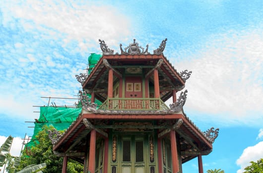 Chinese pagoda under blue sky in thailand.