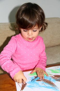 a child drawing at home