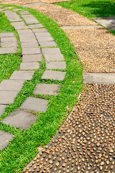 Pebbles are embedded on floor for foot massage.