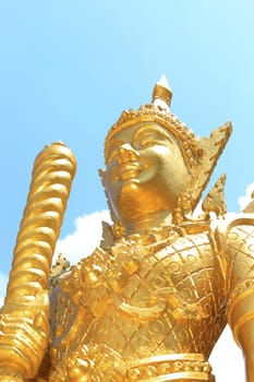 Statue of golden guardian at Wat Paknam Joelo in Chachoengsao province at thailand.