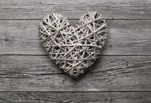 Heart shaped decoration made of straw.