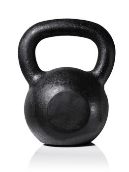 Rough and tough heavy cast iron kettlebell isolated on white with natural reflection.