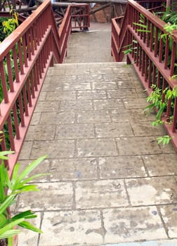 Pathway made ������of bricks in various colors at garden.