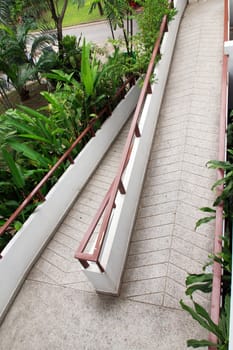 Pathway made ������of bricks in various colors at garden.