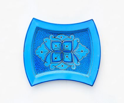 Colorful ceramics or porcelain on the wall.