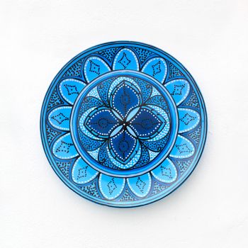 Colorful ceramics or porcelain on the wall.